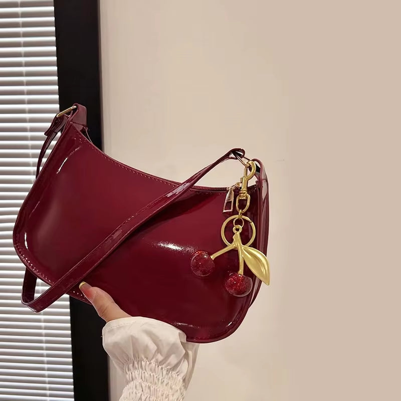 Women's PU Leather Handbag Versatile Fashion Solid Color Cherry Pendant Shoulder Bag